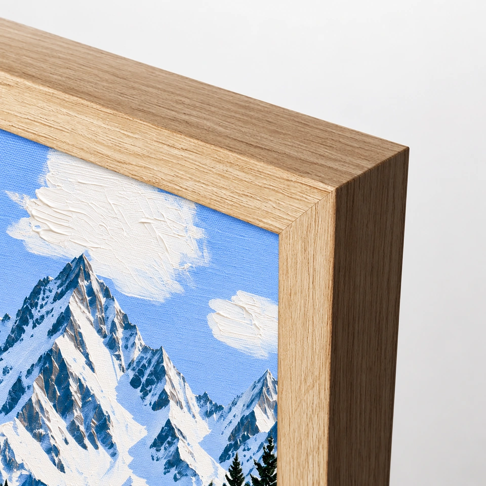 Light wood-tone frame corner beside the Alpine slope painting